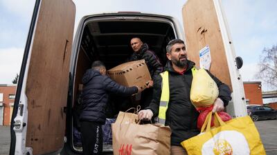 Volunteers at the Bearded Broz community project drop-off zone in Smethwick, West Midlands, prepare donations to send to Turkey and Syria, on Monday. PA
