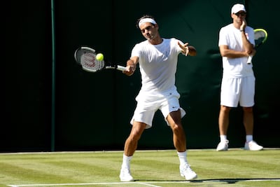 Roger Federer is bidding for a record-extending ninth men's singles title at Wimbledon. Matthew Stockman / Getty Images