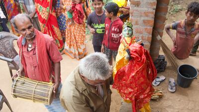 Puppeteers prepare for a show at their village, in Odisha's Kendrapara district.