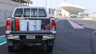 Gallons of paint arrive at the track. Khushnum Bhandari/ The National