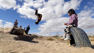 Children play at a park in Baikonur, Kazakhstan. EPA