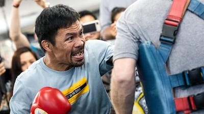 Manny Pacquiao sent a message to Floyd Mayweather Jr trying to tempt his long-term rival out of retirement. AFP