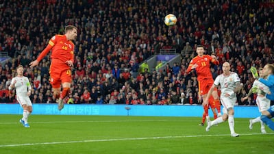 Wales midfielder Aaron Ramsey scores their first goal. EPA