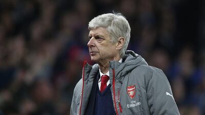 Arsenal manager Arsene Wenger looks dejected after his side's 3-0 loss to Crystal Palace on Monday. Matthew Childs / Reuters