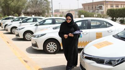A driving instructor arrives at Saudi Aramco Driving Centre in Dhahran, Saudi Arabia. Ahmed Jadallah / Reuters