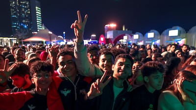 Visitors at the Corniche in Abu Dhabi. Victor Besa / The National