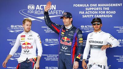 Sebastian Vettel, left, took a backseat to his Australian teammate, Mark Webber, who grabbed the pole for Sunday's Japanese Grand Prix. Lewis Hamilton's Mercedes will start third. Diego Azubel / EPA