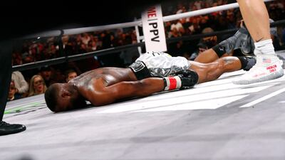 Tyron Woodley lays on the ground after being knocked out by Jake Pau. USA Today