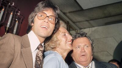 From left to right; Cliff Richard, Dame Vera Lynn and Harry Secombe (1921 - 2001) at a Variety Club luncheon on July 22, 1975. Getty Images