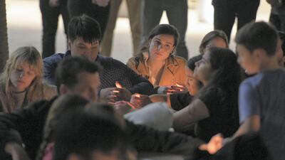 Students at New York University Abu Dhabi hold a vigil on Saadiyat Island in solidarity with the victims of the Christchurch mosque shootings and their families. Khushnum Bhandari for The National