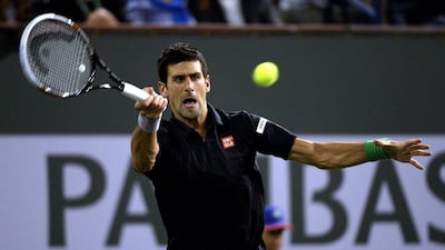 Novak Djokovic moved on to the third round at the BNP Paribas Open at Indian Wells on Sunday. Michael Nelson / EPA / March 9, 2014