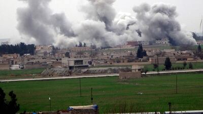 Smoke rises from the Syrian city of Tel Abyad during clashes between ISIL and YPG. AFP