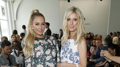 Paris Hilton and Nicky Hilton attend the Kyle & Shahida show during New York Fashion Week on September 8, 2019. AFP