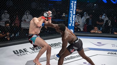 Shawn Bunch lands a right on Rany Saadeh. Photo: UAE Warriors