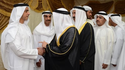 Gen Sheikh Saif bin Zayed, Deputy Prime Minister and Minister of the Interior, together with the family of First Lt Tariq Mohammed Al Shehi, who died in a Bahrain bomb explosion, greet an official delegation from Bahrain who arrived in Ras al Khaimah to pay their respects to the Emirati hero. Courtesy Security Media / March 6, 2014