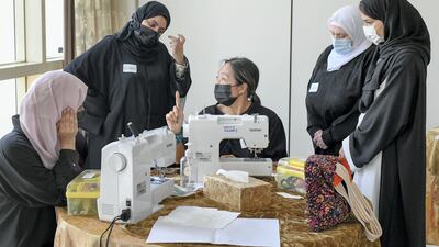 Theresa Tsui teaches women how to sew to help them bolster their income