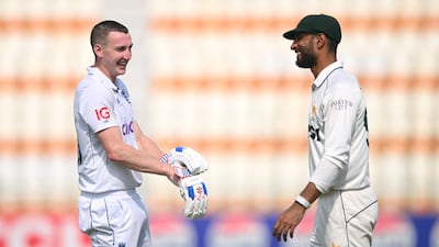 Harry Brook shares a laugh with Pakistan captain Shan Masood. Getty Images