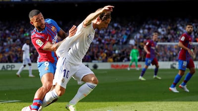 Luka Modric 8 - Looked unfazed by the Barcelona press and engineered ways to get out of it through passing and astute dribbling. Unlucky not to get an assist with an inventive pass that put the ball in a great spot for Benzema. EPA