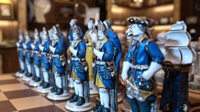 General Obaid Al Ketbi and one of his many favorite collections, A hand crafted and painted chess set given to him by a Russian businessman. Victor Besa / The National