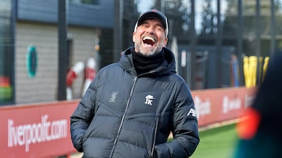 Liverpool manager Jurgen Klopp enjoys a joke at training. Getty