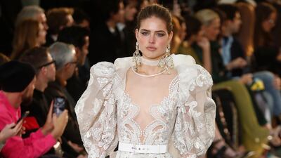 A belted, ruffled number from designer Elie Saab during the Paris Fashion Week. EPA