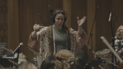 Firdaus Orchestra conductor Monica Woodman rehearses with her team. Photo: Firdaus Orchestra