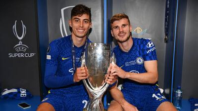 Kai Havertz and Timo Werner of Chelsea pose with the Uefa Super Cup Trophy.