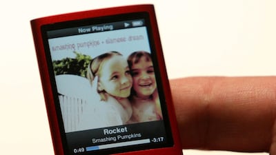 An Apple employee holds the new iPod Nano is displayed during an Apple special event September 9, 2008 in San Francisco, California. Justin Sullivan/Getty Images/AFP