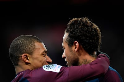 Paris Saint-Germain spent around £400 million on Kylian Mbappe, left, and Neymar. Christophe Simon / AFP