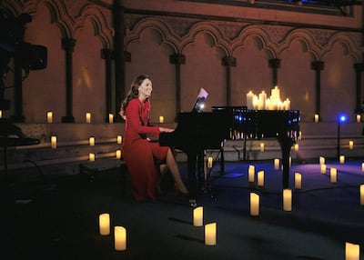 The Duchess of Cambridge played the piano during a carol service broadcast on Christmas Eve. PA