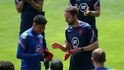 Manager Gareth Southgate with James Justin during training. Reuters