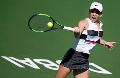 Simona Halep beat a formidable Lesia Tsurenko in their third-round match at the Dubai Duty Free Tennis Championships on Wednesday. Ali Haider / EPA