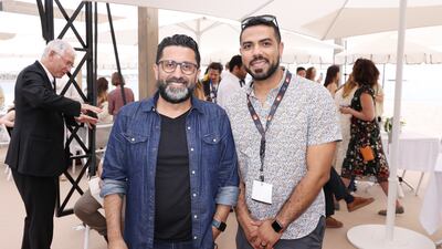 Rony Mitri, left, and guest.