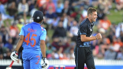 Tim Southee, right, took four wickets for 72 runs for New Zealand on Wednesday. Ross Setford / AP / SNPA
