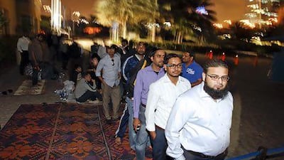 A crowd queue outside a Nakheel office in Dubai as Jumeirah Village Circle villas go on sale last week. Sarah Dea / The National