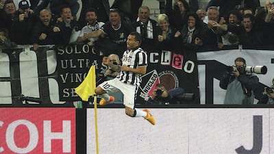 Carlos Tevez of Juventus celebrates his goal against Lazio on Saturday in his team's Serie A win. Marco Luzzani / Getty Images