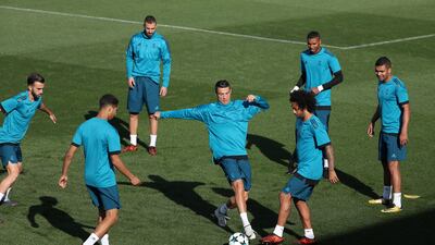 Real Madrid’s Cristiano Ronaldo wins the ball from Marcelo. Sergio Perez / Reuters