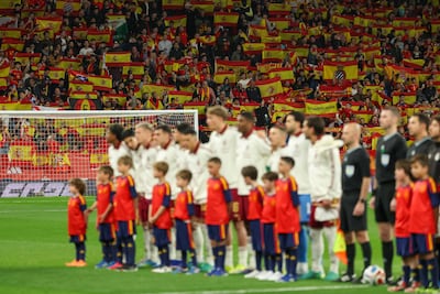 Spain supporters hold up flags during the friendly between Spain and Egypt at the RCDE Stadium near Barcelona. AFP