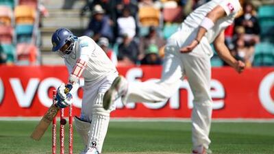 Sri Lanka's Tillakaratne Dilshan is bowled out by Mitchell Starc at Hobart.