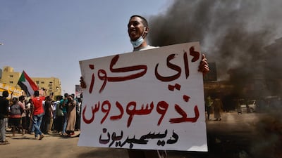 An anti-Muslim Brotherhood demonstrator during a protest in Khartoum. AFP