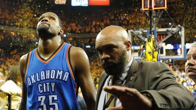 Kevin Durant of the Oklahoma City Thunder walks off the court after being defeated by the Golden State Warriors in Game 7 on Monday night. Robert Reiners / Getty Images / AFP / May 30, 2016
