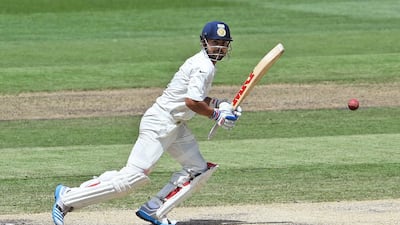 Indian batsman Virat Kohli plays a shot against Australia on the third day of the third cricket Test played at the Melbourne Cricket Ground (MCG) in Melbourne on December 28, 2014. AFP PHOTO/William WEST --IMAGE RESTRICTED TO EDITORIAL USE - STRICTLY NO COMMERCIAL USE--