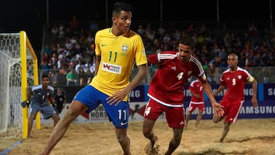 Brazil, in yellow, were too strong for UAE in their opening match of the Beach Soccer Intercontinental Cup in Dubai. Courtesy www.beachsoccer.com