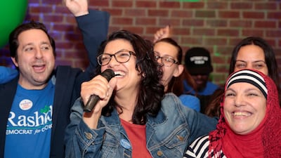 Democrat Rashida Tlaib celebrates her election to the House of Representatives with her mother. Reuters