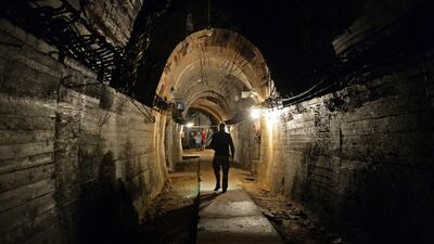 Men walking in the underground galleries, part of Nazi Germany “Riese” construction project under the Ksiaz castle in the area where the Nazi gold train is supposedly hidden underground, in Walbrzych, Poland. Janek Skarzynzki/ AFP Photo