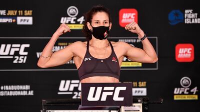 Karol Rosa of Brazil poses on the scale during the UFC 251 official weigh-in.