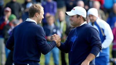 Jordan Spieth, left, and Patrick Reed of the United States made up the youngest American partnership ever in Ryder Cup play, but didn't play like rookies, winning 5 & 4 in the morning fourball session against Stephan Gallacher and Ian Poulter. Andrew Redington / Getty Images