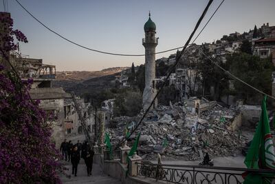A minaret stands above a mosque destroyed by an Israeli air strike on Kherbet Selem in southern Lebanon on December 3, 2024. Getty Images