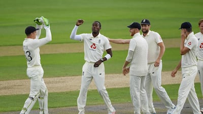 Jofra Archer celebrates with his England teammates after clean-bowling Abid Ali. Getty