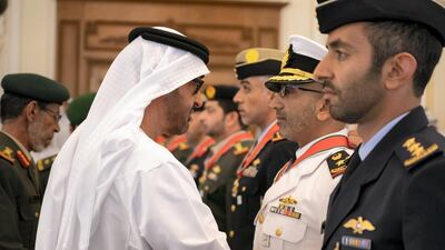 Sheikh Mohamed bin Zayed presents an Emirates Military Medals to members of the UAE Armed Forces, Ministry of Interior and Abu Dhabi Police during a Sea Palace barza.